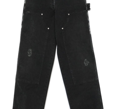 Golden Goose jeans with distressed effect and front patches