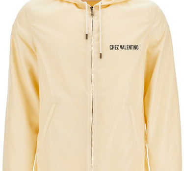 Valentino Garavani beige hooded windbreaker in logoed polyamide