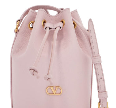 Valentino Garavani borsa a sacchetto mini in pelle rosa quarzo con tracolla regolabile