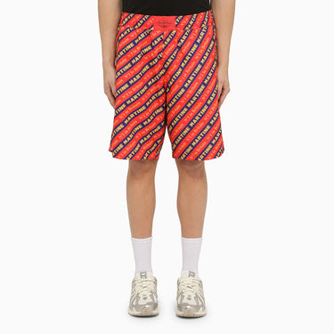Martine Rose Red Bermuda shorts with logo print
