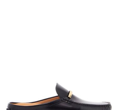 Tod'S black calfskin slip-on loafers with metallic strap and rubber sole